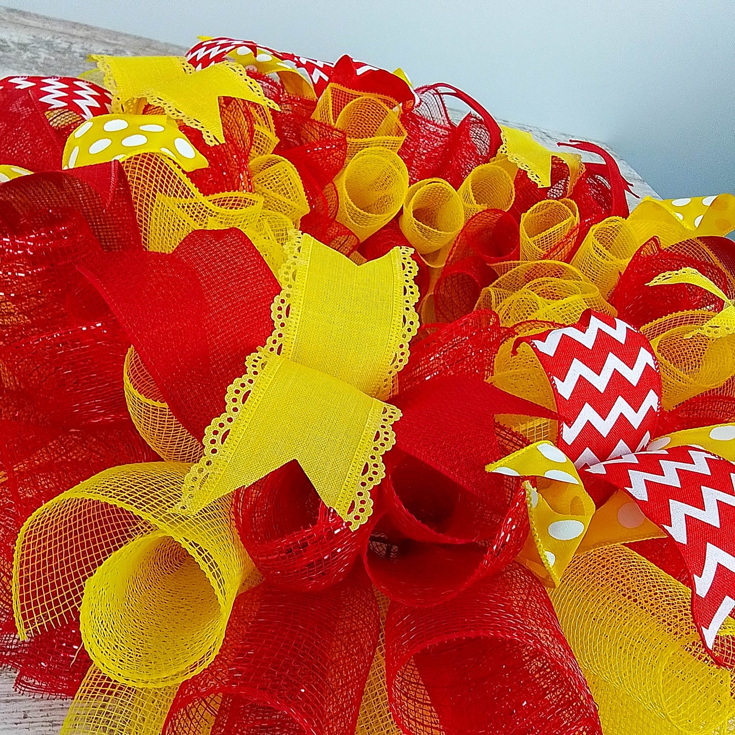 Bold, Festive Wreath, Vibrant Red and Yellow Decor, Indoor and Outdoor Celebration Decoration